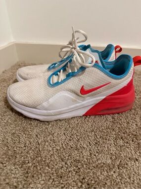 Nike Woman’s White Sneakers with Red Swoosh and Blue Trim